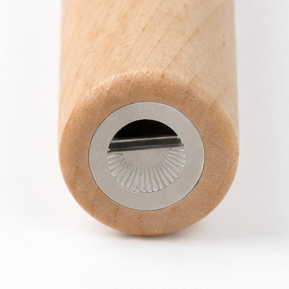 Close-up van de onderkant van de Purivo-inhaler met de metalen kamer voor de pod